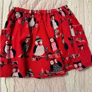 Mini Boden skirt. Bright orangey/red with owls. Size 7/8. Euc. Pockets.
